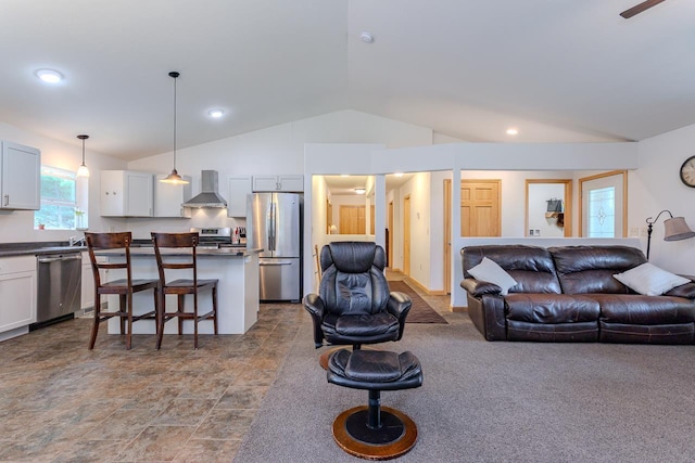 5304 Ski Ln, Weston, WI 54476 - living room featuring lofted ceiling and recessed lighting