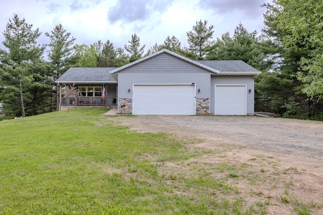5304 Ski Ln, Weston, WI 54476 - ranch-style house with a porch, a garage, driveway, a front yard, and stone siding