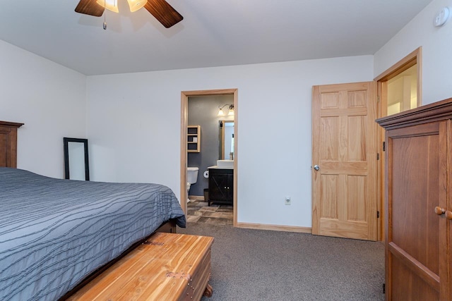 5304 Ski Ln, Weston, WI 54476 - bedroom with carpet flooring, baseboards, ensuite bath, and a ceiling fan