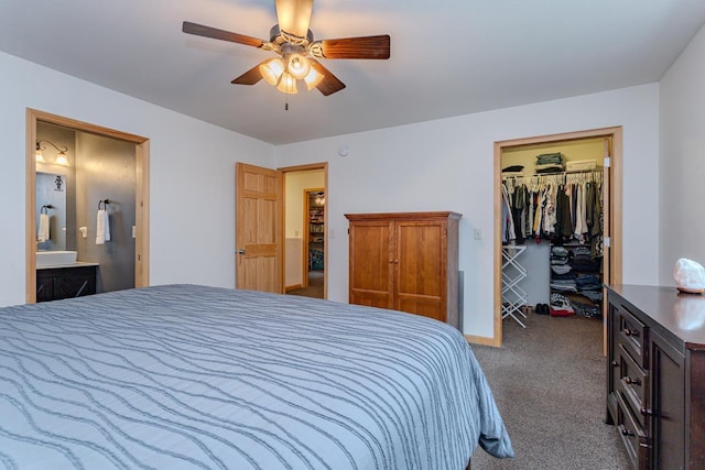 5304 Ski Ln, Weston, WI 54476 - bedroom with carpet floors, a spacious closet, ensuite bath, ceiling fan, and a closet