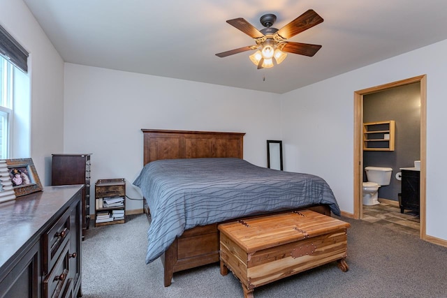 5304 Ski Ln, Weston, WI 54476 - bedroom with light colored carpet, baseboards, a ceiling fan, and connected bathroom
