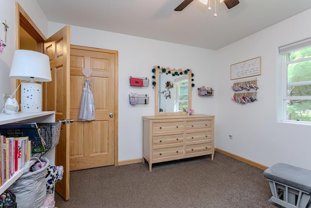5304 Ski Ln, Weston, WI 54476 - bedroom with dark colored carpet, baseboards, and a ceiling fan