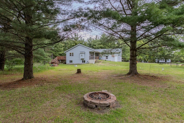 5304 Ski Ln, Weston, WI 54476 - view of green lawn with a fire pit