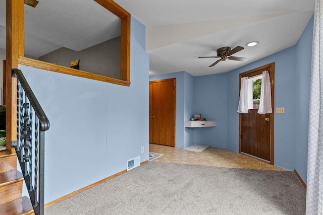 768 Reed St, Neenah, WI 54956 - carpeted foyer entrance featuring ceiling fan and baseboards