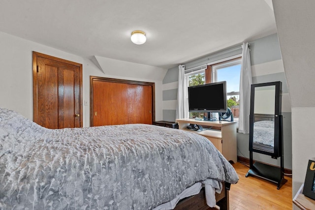 768 Reed St, Neenah, WI 54956 - bedroom featuring light wood-style flooring and lofted ceiling