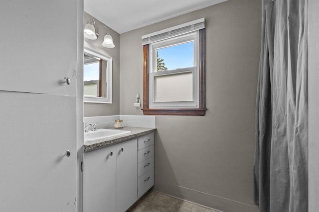 768 Reed St, Neenah, WI 54956 - bathroom with vanity and baseboards