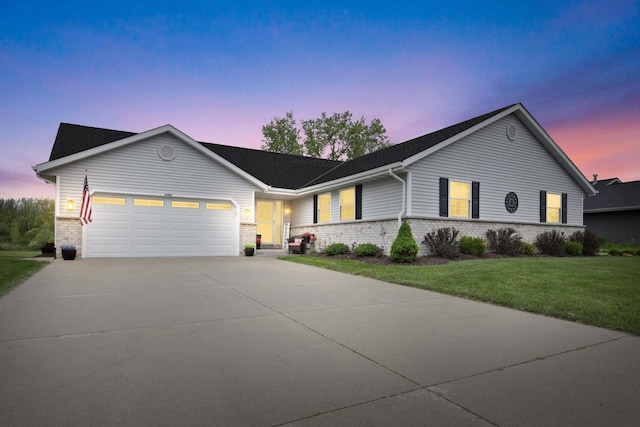 6905 Jamestown Ct, West Bend, WI 53090 - ranch-style house featuring brick siding, a garage, concrete driveway, and a front yard