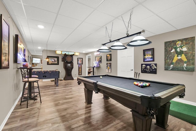 6905 Jamestown Ct, West Bend, WI 53090 - playroom with a paneled ceiling, baseboards, pool table, and wood finished floors