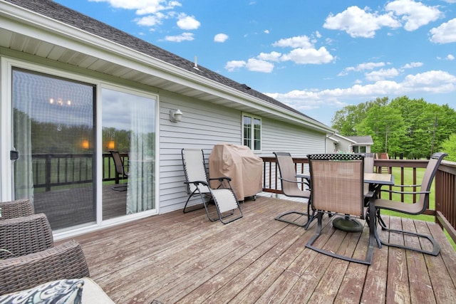 6905 Jamestown Ct, West Bend, WI 53090 - wooden terrace with outdoor dining area and grilling area