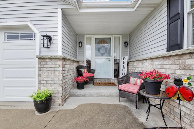 6905 Jamestown Ct, West Bend, WI 53090 - property entrance with a porch