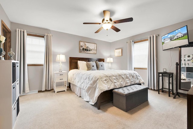 6905 Jamestown Ct, West Bend, WI 53090 - bedroom featuring light colored carpet, ceiling fan, and baseboards