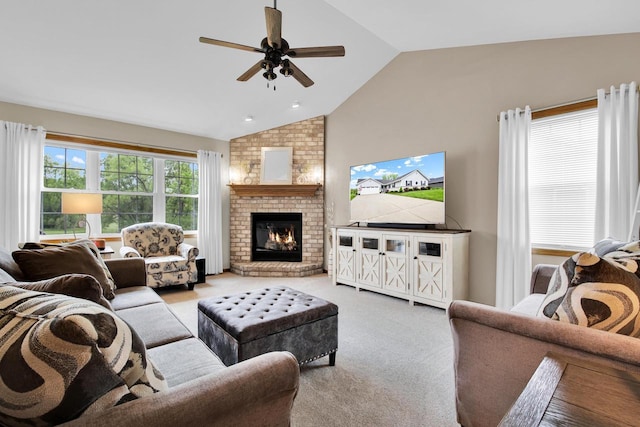 6905 Jamestown Ct, West Bend, WI 53090 - living area featuring lofted ceiling, a ceiling fan, carpet, and a brick fireplace