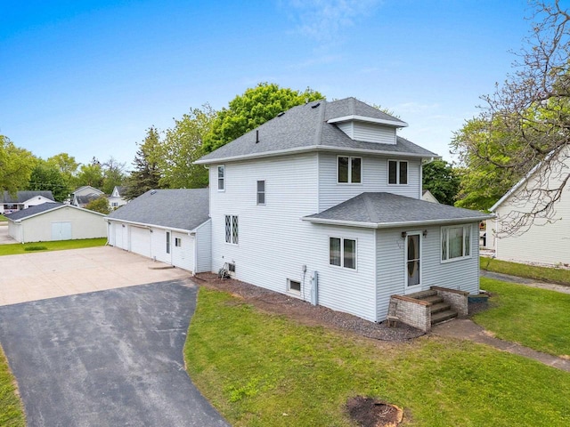 314 Summit St, Pulaski, WI 54162 - view of home's exterior with a shingled roof, a garage, and a yard