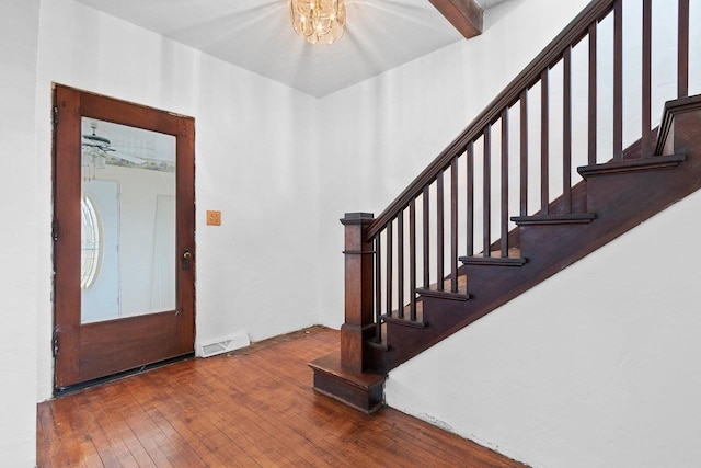 314 Summit St, Pulaski, WI 54162 - foyer entrance featuring wood-type flooring, stairs, and a chandelier