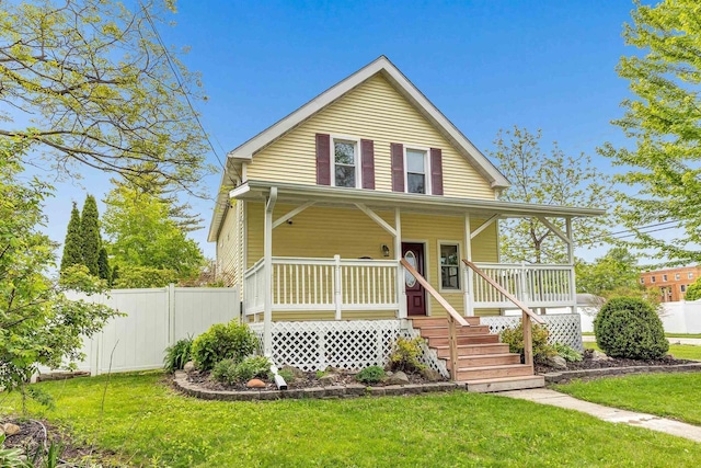 127 Flora St, Pulaski, WI 54162 - view of front of house with a porch