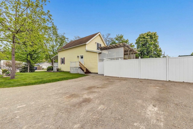 127 Flora St, Pulaski, WI 54162 - view of side of property with a pergola