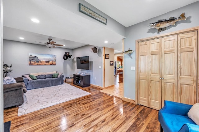 127 Flora St, Pulaski, WI 54162 - living room featuring wood finished floors, a ceiling fan, recessed lighting, and baseboards