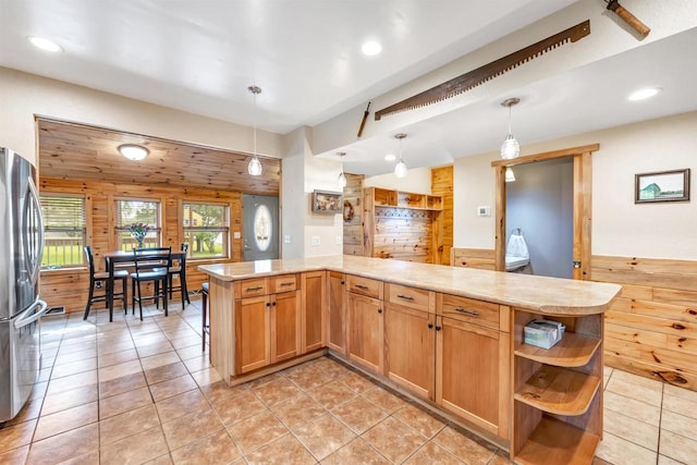 127 Flora St, Pulaski, WI 54162 - kitchen with freestanding refrigerator, open shelves, recessed lighting, hanging light fixtures, and light tile patterned floors