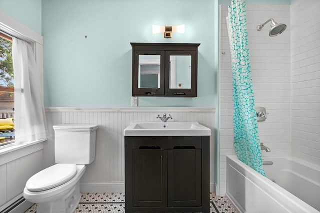 2314 Sommers Ave, Madison, WI 53704 - bathroom with a wainscoted wall, vanity, shower / tub combo, toilet, and a baseboard radiator