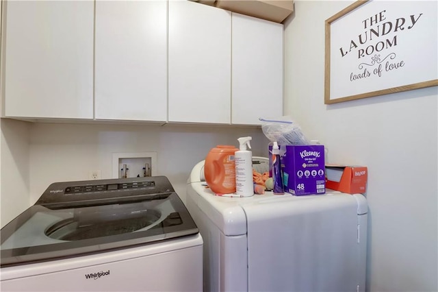 2531 Balsam Ct, Eau Claire, WI 54703 - laundry room featuring washing machine and dryer and cabinet space