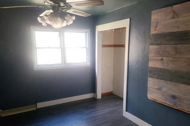 3602 N 85th St Unit 3604, Milwaukee, WI 53222 - unfurnished bedroom with wood finished floors, baseboards, and a closet