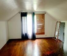 3602 N 85th St Unit 3604, Milwaukee, WI 53222 - additional living space featuring vaulted ceiling and wood finished floors