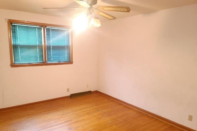 3602 N 85th St Unit 3604, Milwaukee, WI 53222 - empty room with a ceiling fan, light wood finished floors, and baseboards