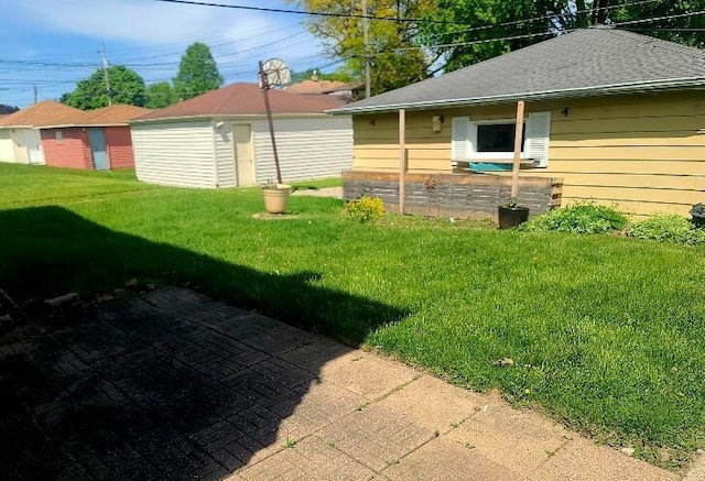 3602 N 85th St Unit 3604, Milwaukee, WI 53222 - view of green lawn featuring an outdoor structure