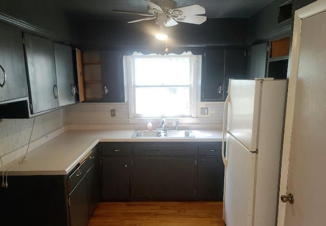 3602 N 85th St Unit 3604, Milwaukee, WI 53222 - kitchen featuring freestanding refrigerator, a sink, open shelves, ceiling fan, and light wood finished floors