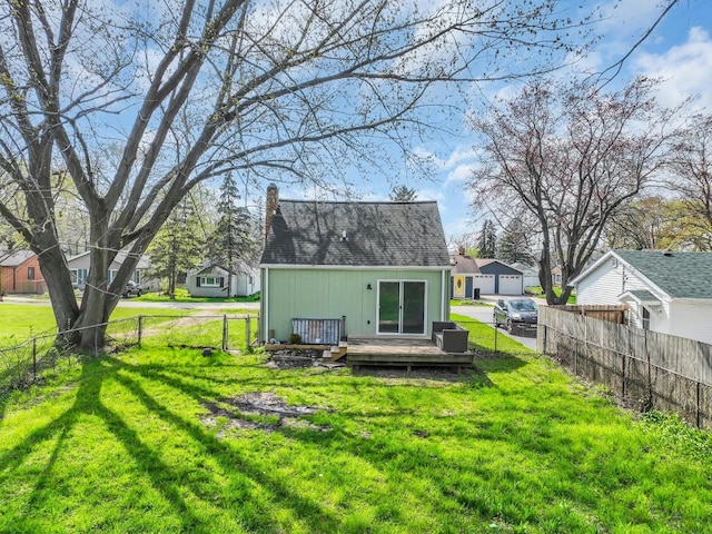 4208 Locust St, Delavan, WI 53115 - rear view of property featuring a deck and a chimney
