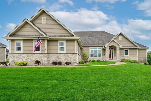 W229N3637 Sterling Ct, Pewaukee, WI 53072 - craftsman-style house featuring stone siding, a front lawn, and a shingled roof