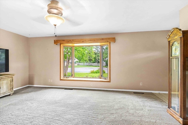 2931 N Ave, Wisconsin Rapids, WI 54495 - unfurnished living room featuring baseboards and carpet