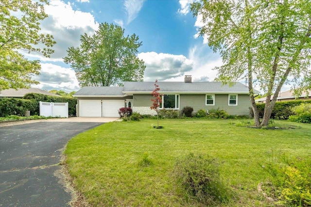 2931 N Ave, Wisconsin Rapids, WI 54495 - ranch-style house featuring a garage, driveway, and a chimney