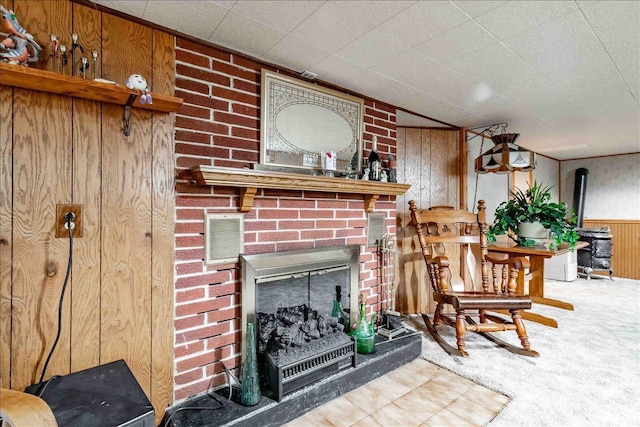 2931 N Ave, Wisconsin Rapids, WI 54495 - carpeted living area with wooden walls and a brick fireplace