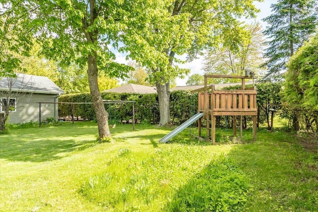 2931 N Ave, Wisconsin Rapids, WI 54495 - view of grassy yard featuring a playground
