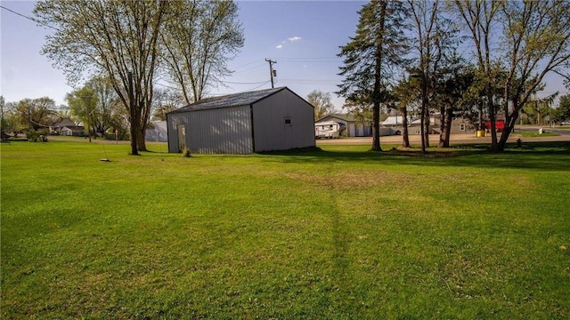 207 State Road 25, Wheeler, WI 54772 - view of green lawn featuring an outdoor structure