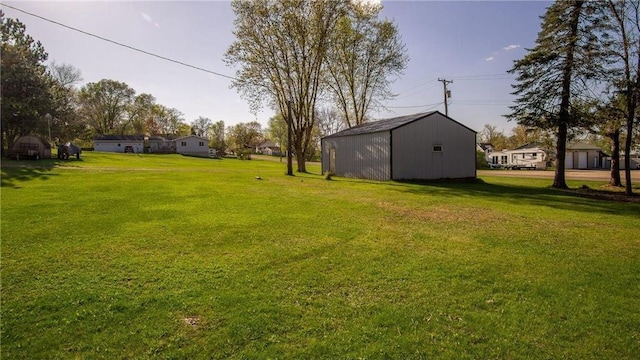 207 State Road 25, Wheeler, WI 54772 - view of green lawn featuring an outdoor structure