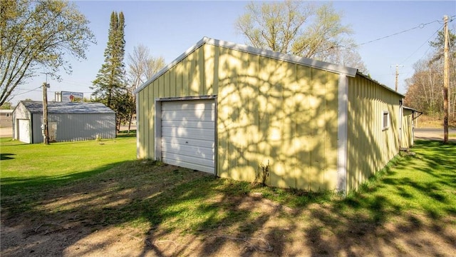 207 State Road 25, Wheeler, WI 54772 - detached garage featuring driveway