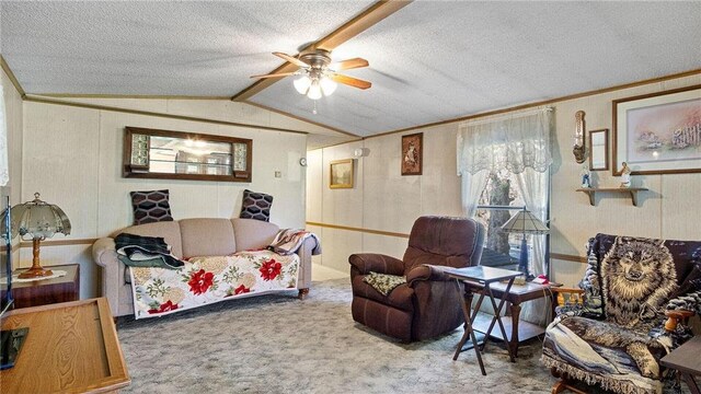 207 State Road 25, Wheeler, WI 54772 - living room with ceiling fan, carpet flooring, ornamental molding, vaulted ceiling, and a textured ceiling