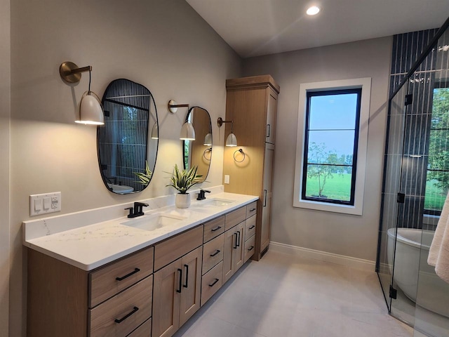 1102 Moll Dr, Waunakee, WI 53597 - full bathroom with double vanity and a freestanding bath