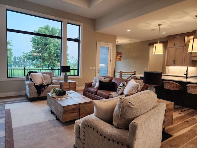 1102 Moll Dr, Waunakee, WI 53597 - living room with recessed lighting and light wood-type flooring