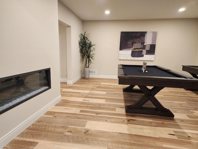 1102 Moll Dr, Waunakee, WI 53597 - recreation room with wood finished floors, billiards table, and recessed lighting