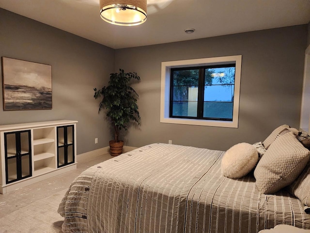 1102 Moll Dr, Waunakee, WI 53597 - carpeted bedroom featuring baseboards