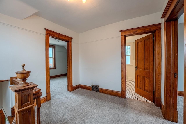 1401 N 2nd St, Wausau, WI 54403 - carpeted empty room with healthy amount of natural light and baseboards