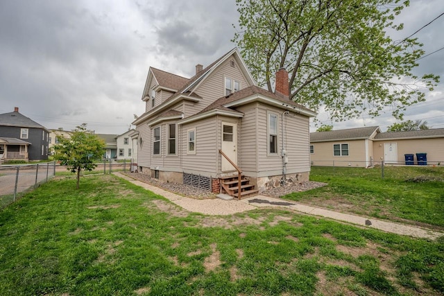 1401 N 2nd St, Wausau, WI 54403 - view of front of home featuring entry steps and a chimney