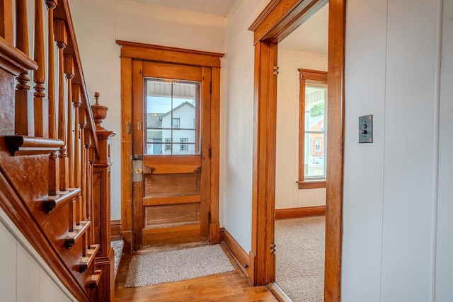 1401 N 2nd St, Wausau, WI 54403 - doorway to outside with plenty of natural light, light wood finished floors, baseboards, and stairs