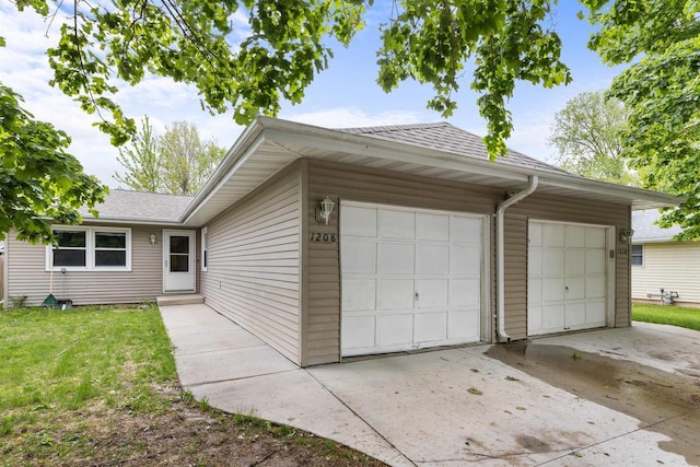 1208 Grove St, Menasha, WI 54952 - garage with driveway