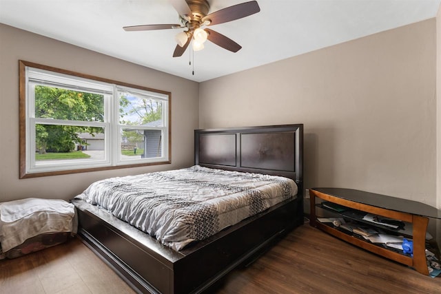 1208 Grove St, Menasha, WI 54952 - bedroom featuring wood finished floors and ceiling fan
