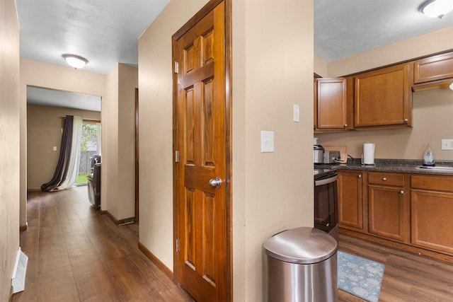 1208 Grove St, Menasha, WI 54952 - corridor with dark wood-style flooring and a sink