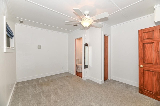 2811 Alpine Ln, Delavan, WI 53115 - spare room featuring light colored carpet, ceiling fan, and crown molding